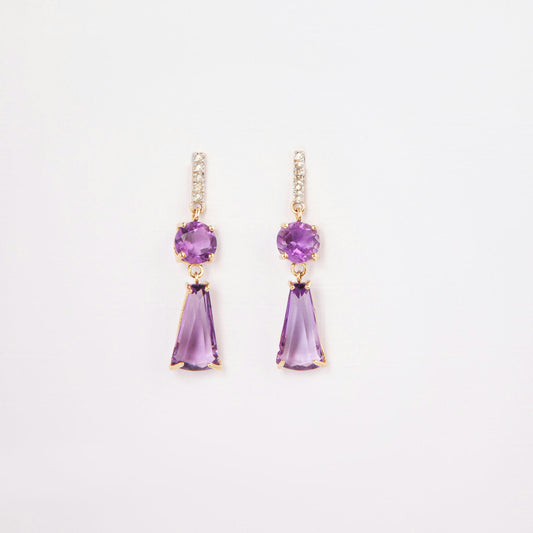 14K gold earrings featuring amethysts and diamond accents.