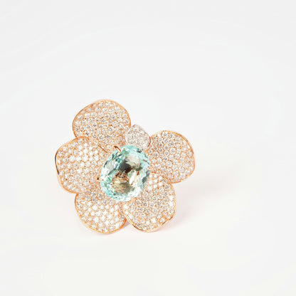 Statement ring in 18K rose gold featuring 9.2 ct GIA-certified green Paraiba tourmaline and 4.00 ct natural diamonds.