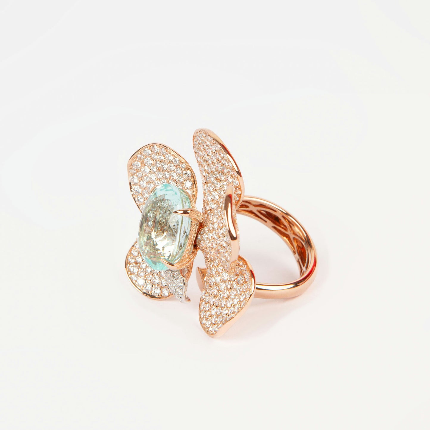 Statement ring in 18K rose gold featuring 9.2 ct GIA-certified green Paraiba tourmaline and 4.00 ct natural diamonds.