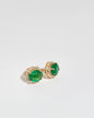 Stud earrings in 14K yellow gold featuring two oval mixed-cut natural emeralds (6.60 ct) and 51 natural diamonds (0.40 ct).